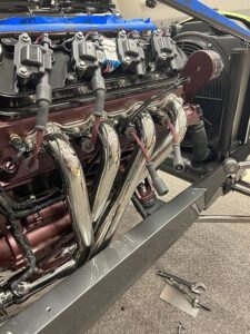 Polished headers on car 2 450x600