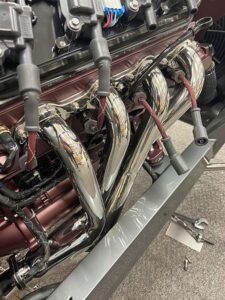 Polished headers on car 3 450x600